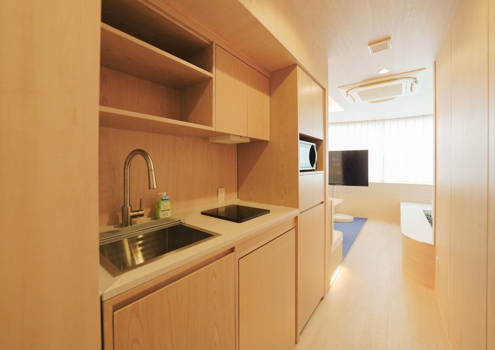 ファミリー スイート ベッド (複数台) 簡易キッチン シティビュー 専用簡易キッチン0 | UH Suite Namba Station The Spa