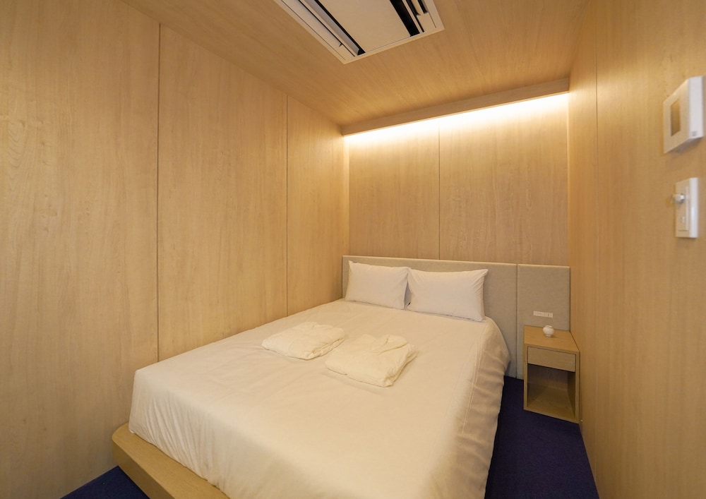 ファミリー スイート ベッド (複数台) 簡易キッチン シティビュー 客室2 | UH Suite Namba Station The Spa