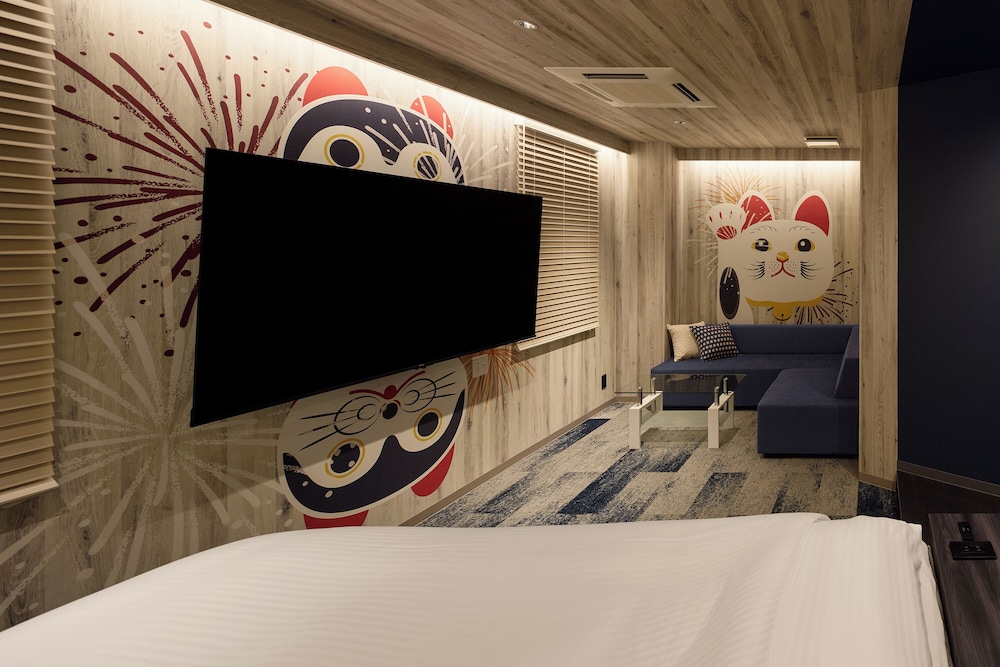 デラックス ルーム シティビュー 建物のデザイン1 | HOTEL HOQA 花色の湯