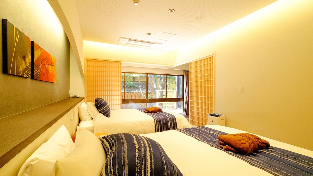 スーペリア ツインルーム サウナ ガーデンビュー 客室2 | はわい温泉　千年亭