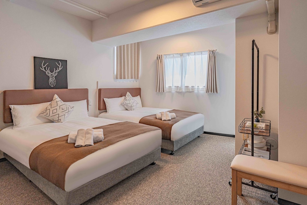 コンフォート ツインルーム バルコニー シティビュー 客室9 | b&Tsutenkaku