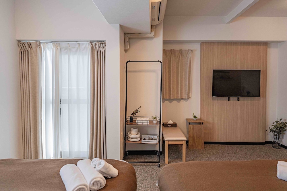 コンフォート ツインルーム バルコニー シティビュー 客室2 | b&Tsutenkaku