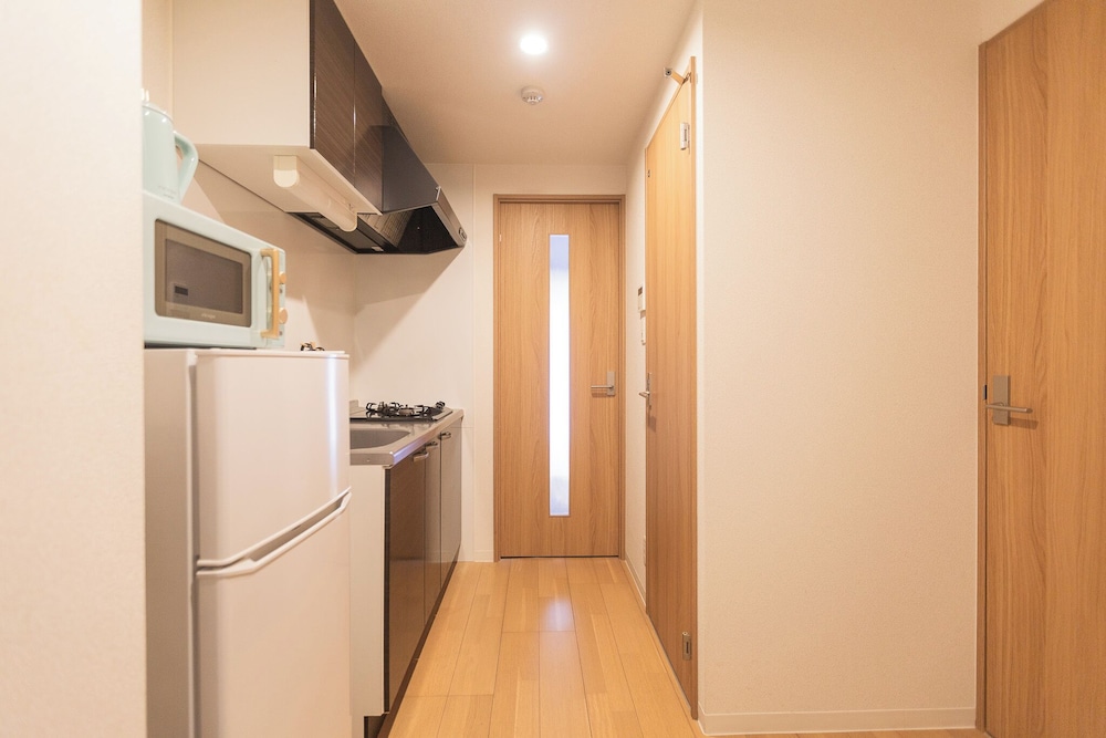 ファミリー アパートメント バルコニー シティビュー 客室内のダイニングエリア0 | b&今里店