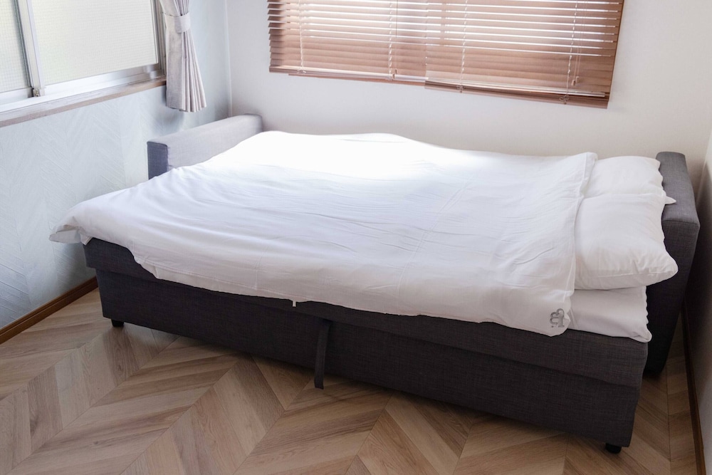 ベーシック アパートメント 禁煙 シティビュー リビング エリア2 | Aimer202