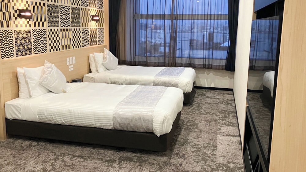 ツインルーム 禁煙 (Residential Twin Room) | リブマックスさきしまコスモタワーホテル