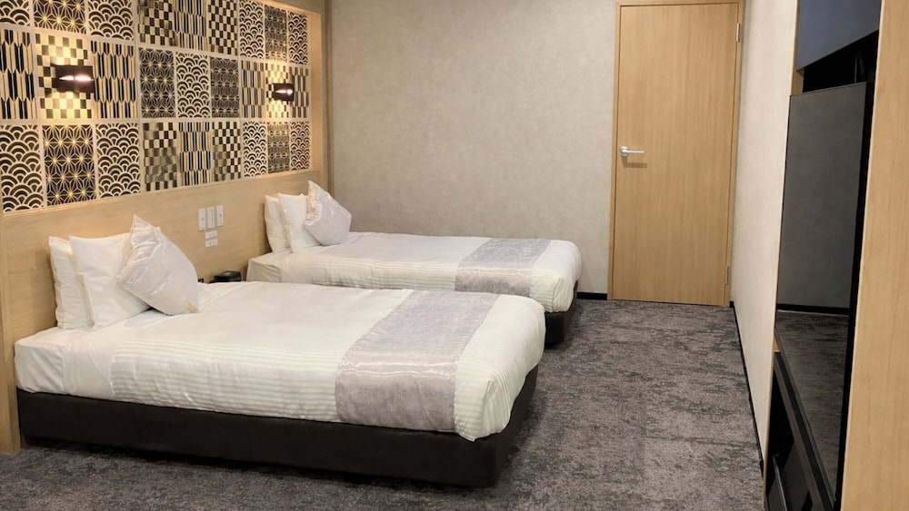 ツインルーム 禁煙 コーナー (Residential Corner Twin Room) | リブマックスさきしまコスモタワーホテル