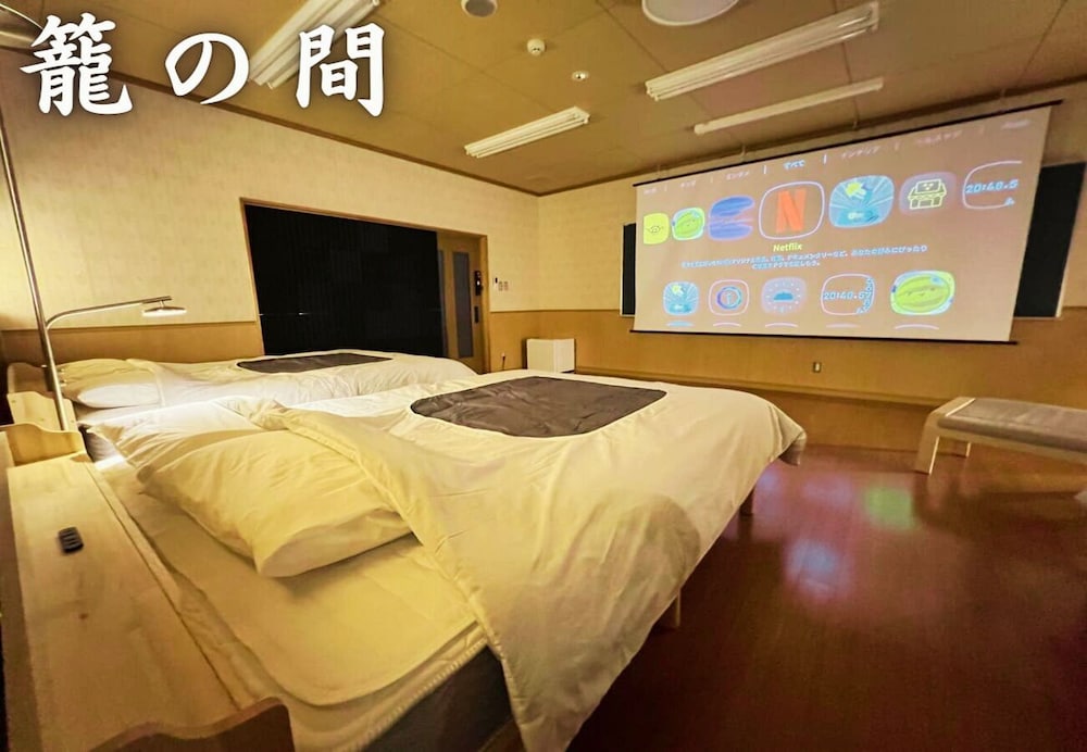 ラグジュアリー ダブルルーム ベッド (複数台) マウンテンビュー 客室2 | Suzukagojo