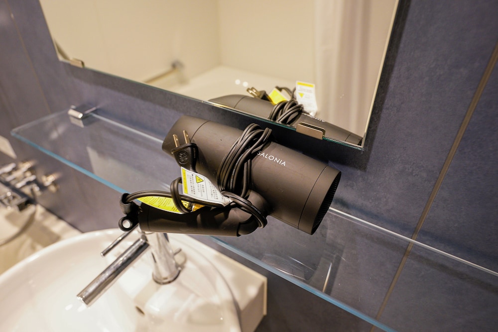 ベーシック ツインルーム シングルベッド 2 台 禁煙 専用バスルーム バスルームの設備3 | 中野ワールドホテル