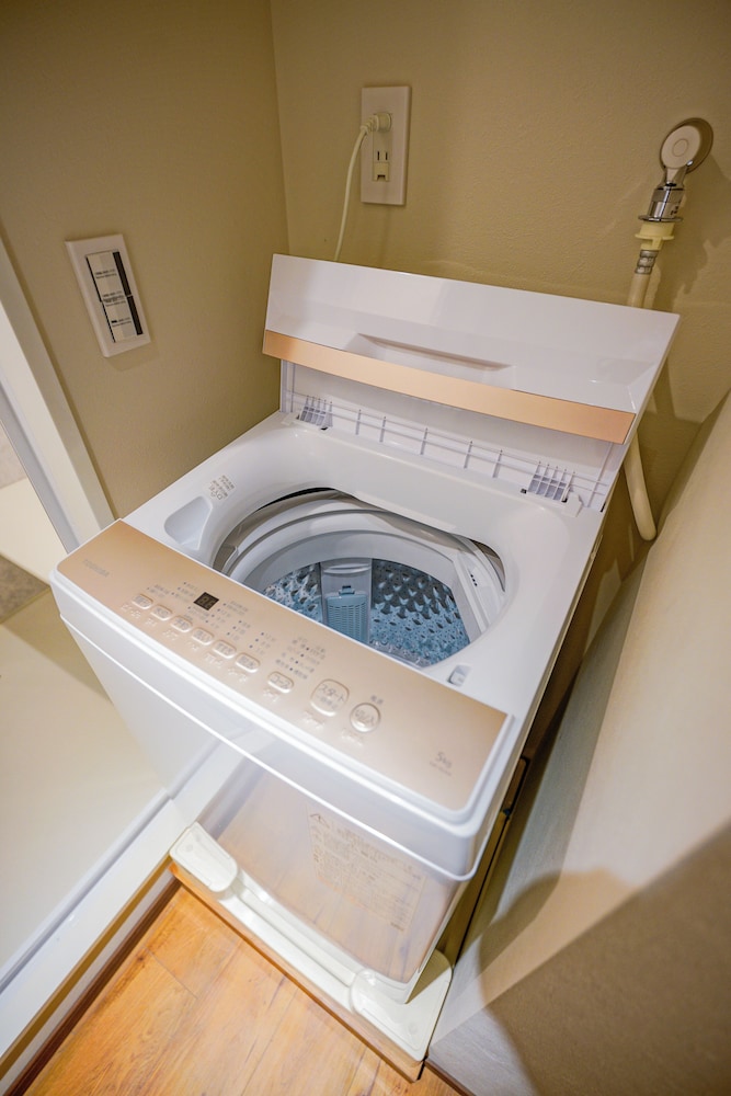 デラックス スイート 2 ベッドルーム 専用バスルーム シティビュー ランドリー0 | 中野ワールドホテル