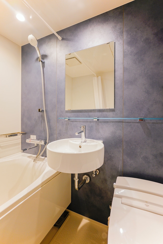 ベーシック ツインルーム シングルベッド 2 台 禁煙 専用バスルーム バスルームの設備4 | 中野ワールドホテル