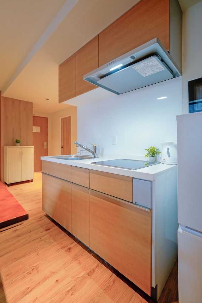 デラックス スイート 2 ベッドルーム 専用バスルーム シティビュー 専用キッチン1 | 中野ワールドホテル