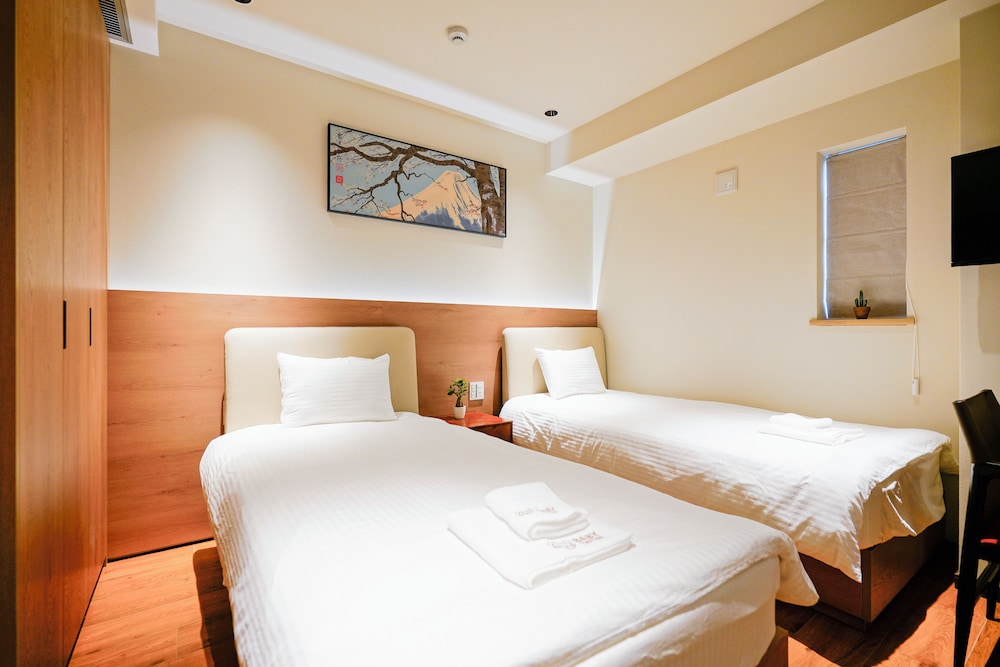 ベーシック ツインルーム シングルベッド 2 台 禁煙 専用バスルーム 客室4 | 中野ワールドホテル