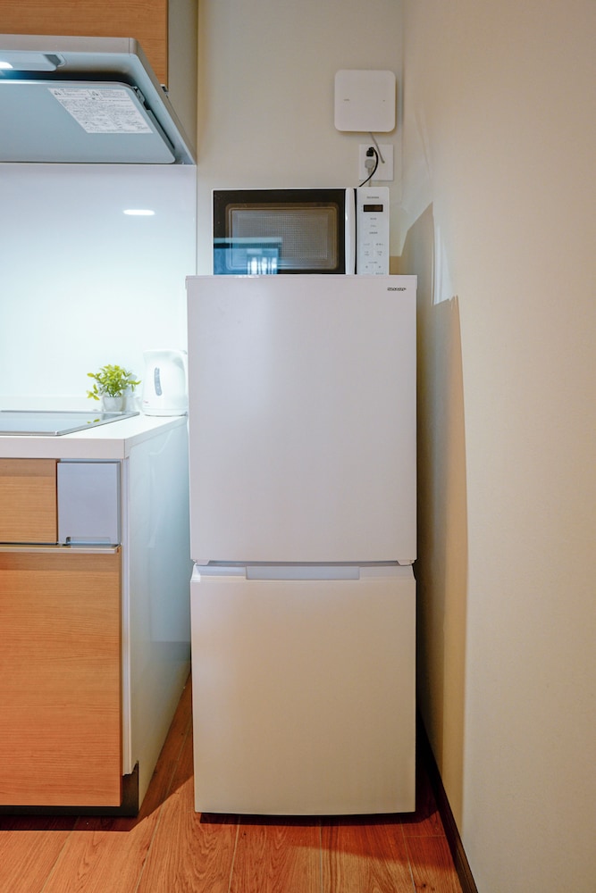 デラックス スイート 2 ベッドルーム 専用バスルーム シティビュー 小型冷蔵庫0 | 中野ワールドホテル