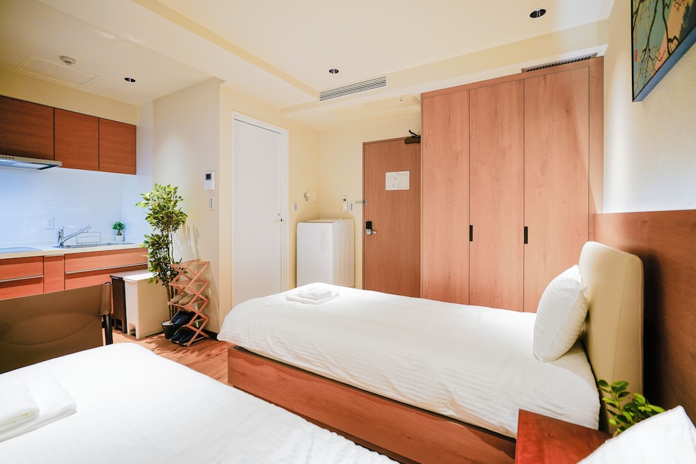 ベーシック ツインルーム シングルベッド 2 台 禁煙 専用バスルーム 客室3 | 中野ワールドホテル