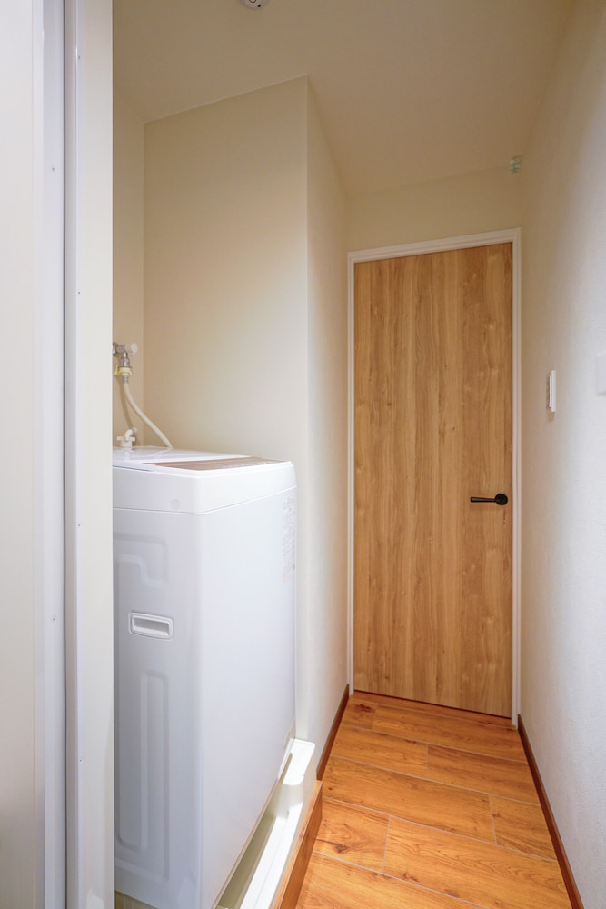 デラックス スイート 2 ベッドルーム 専用バスルーム シティビュー ランドリー1 | 中野ワールドホテル