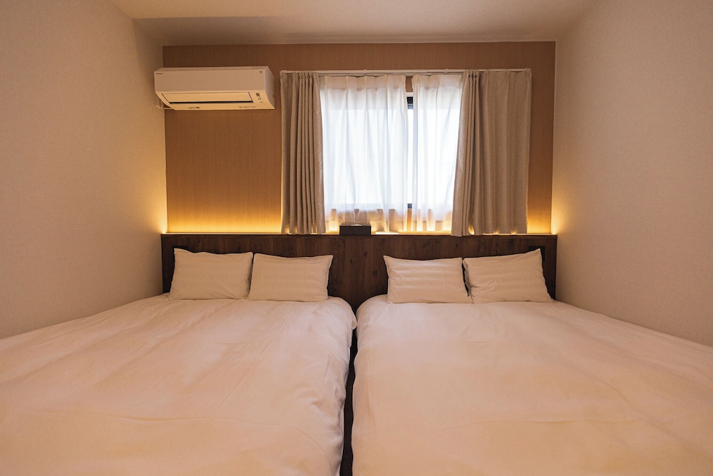 デラックス ヴィラ コートヤードビュー 客室5 | b&FLAT-Hanazono