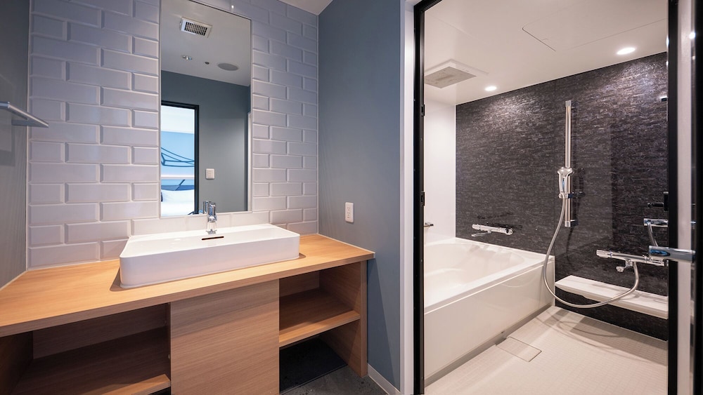 デラックス ツインルーム 禁煙 バスルーム0 | クインテッサホテル大阪梅田 Comic&Books