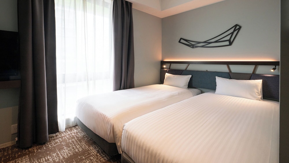 ツインルーム 禁煙 | クインテッサホテル大阪梅田 Comic&Books