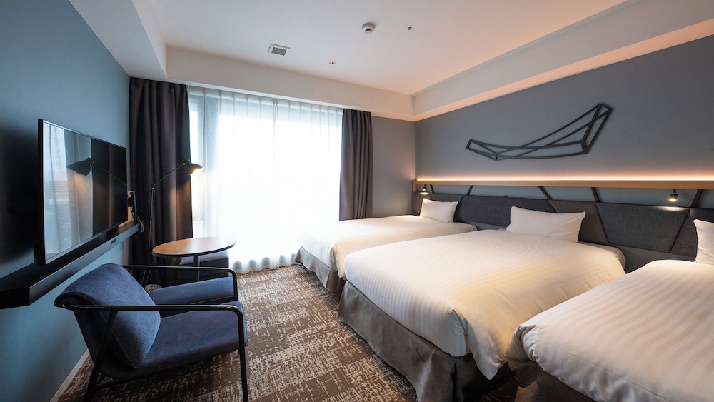 デラックス ツインルーム 禁煙 | クインテッサホテル大阪梅田 Comic&Books