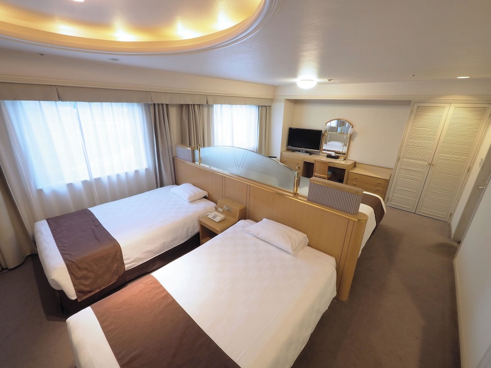 デラックス 4 人部屋 | 日和ホテル松山