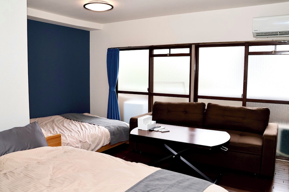 ベーシック アパートメント ベッド (複数台) バルコニー シティビュー リビング エリア0 | Casa M hacchobori Stay