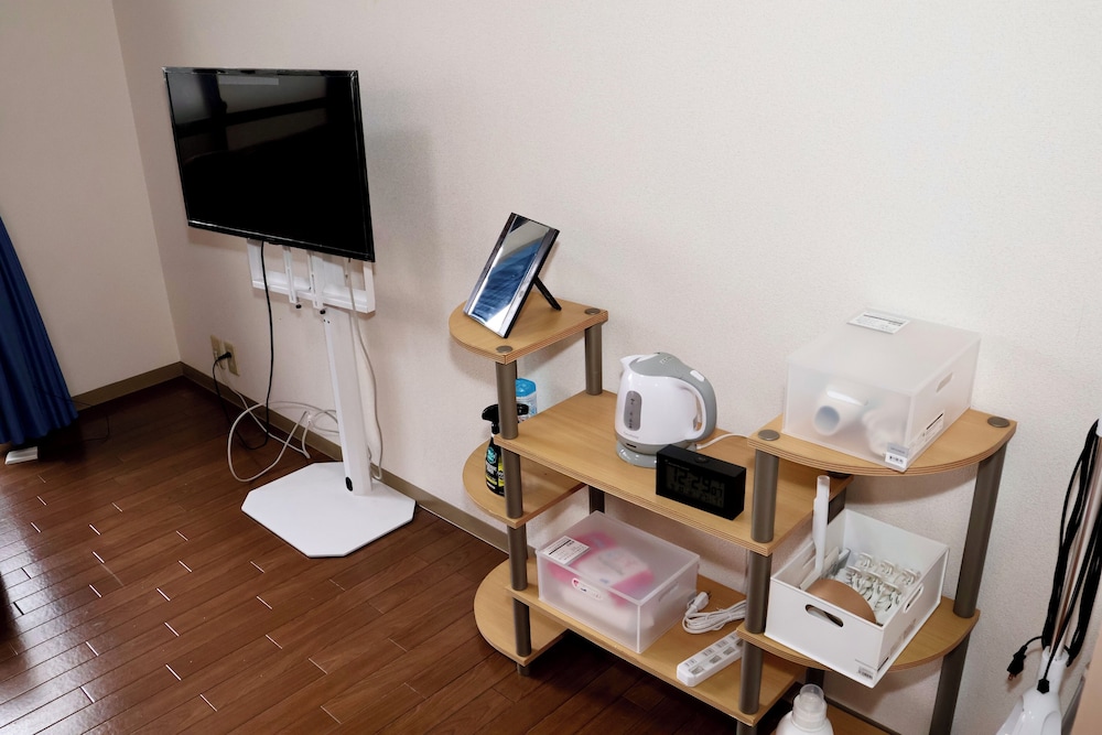 ベーシック アパートメント ベッド (複数台) バルコニー シティビュー リビング エリア1 | Casa M hacchobori Stay