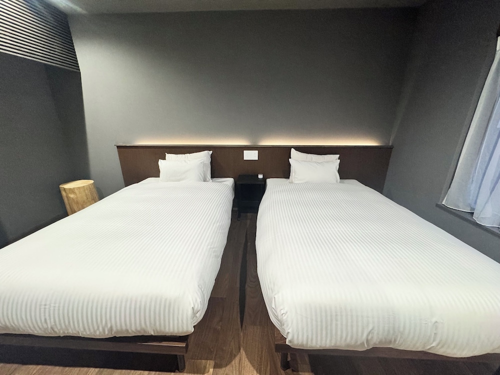 デラックス ヴィラ 3 ベッドルーム 客室1 | The Villa Hotels -SAPPORO-