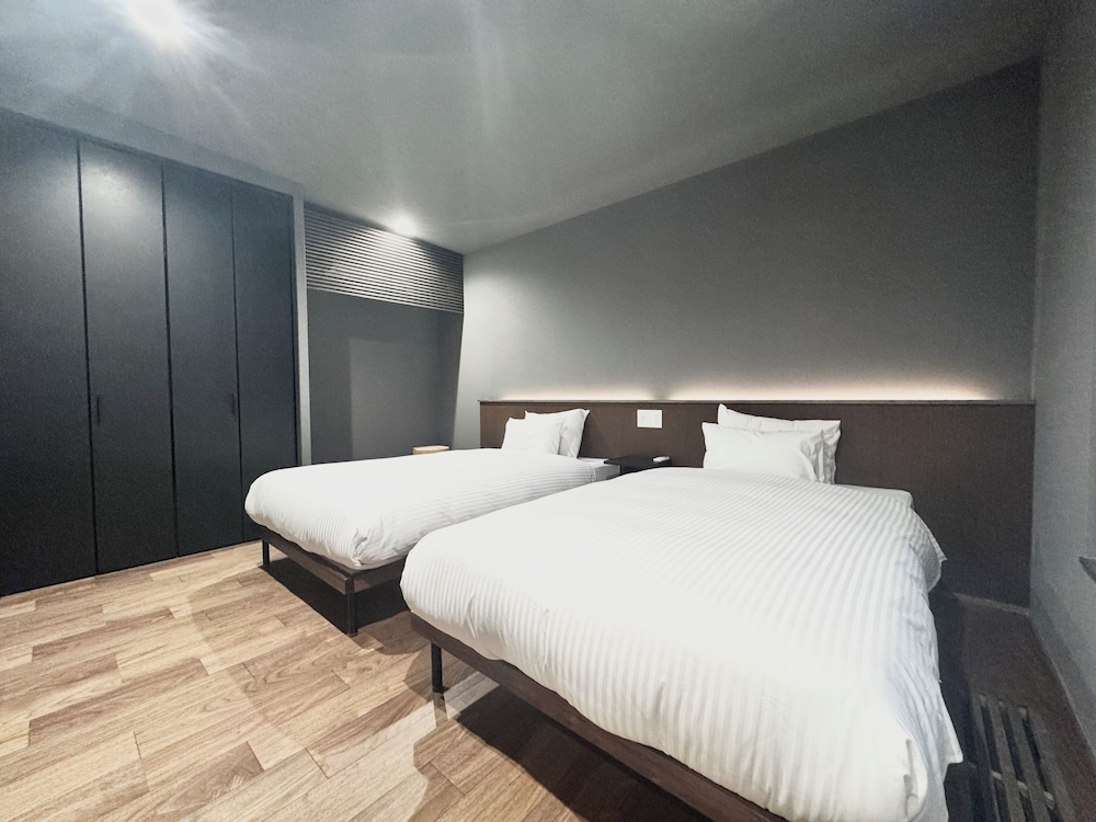 デラックス ヴィラ 3 ベッドルーム 客室3 | The Villa Hotels -SAPPORO-