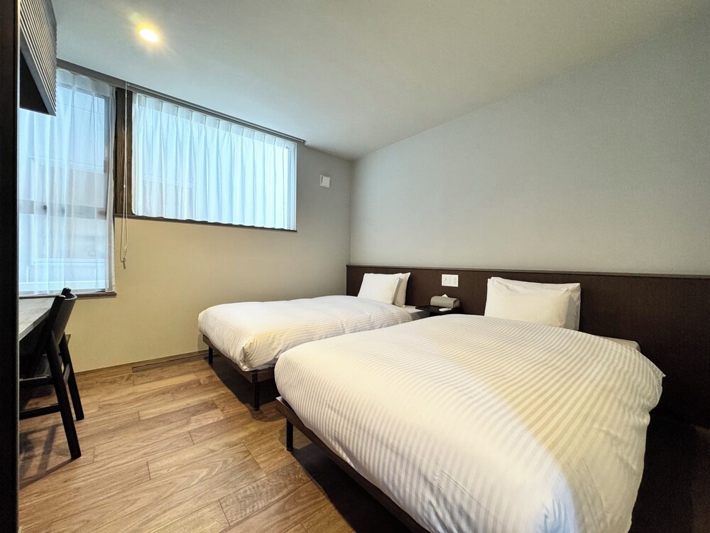 デラックス ヴィラ 3 ベッドルーム 客室2 | The Villa Hotels -SAPPORO-