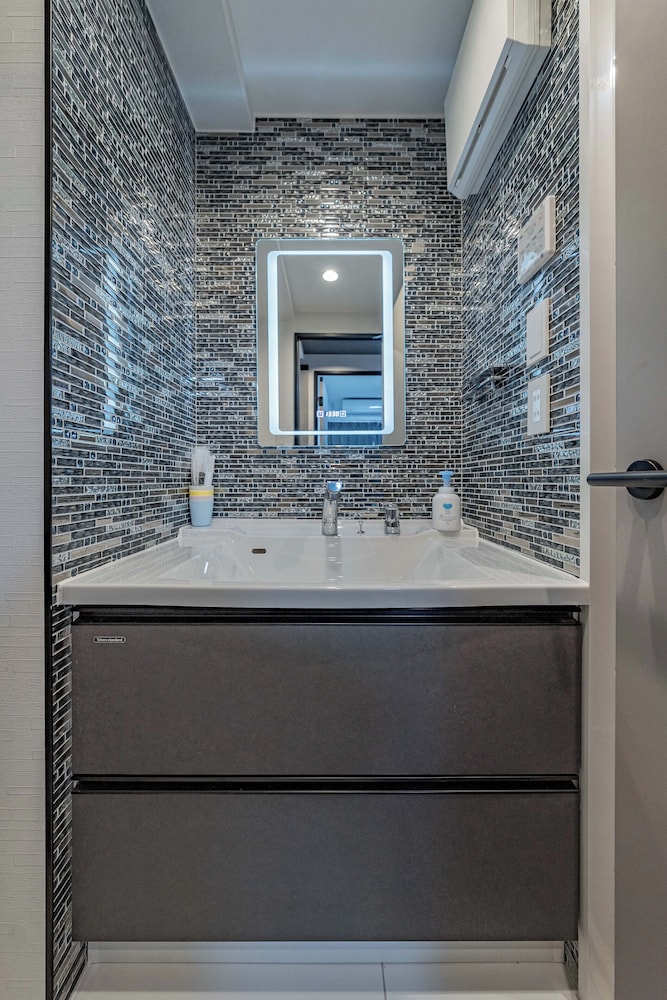 ファミリー スイート バルコニー シティビュー バスルーム3 | Namba River Side Garden Hotel