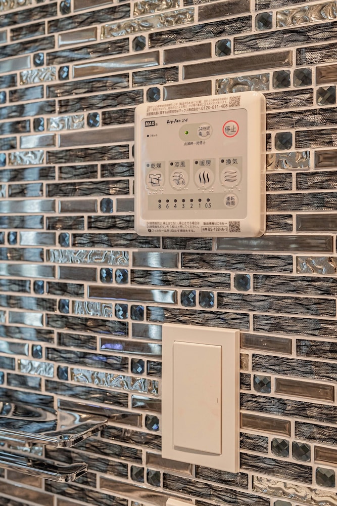 ファミリー スイート バルコニー シティビュー バスルーム2 | Namba River Side Garden Hotel