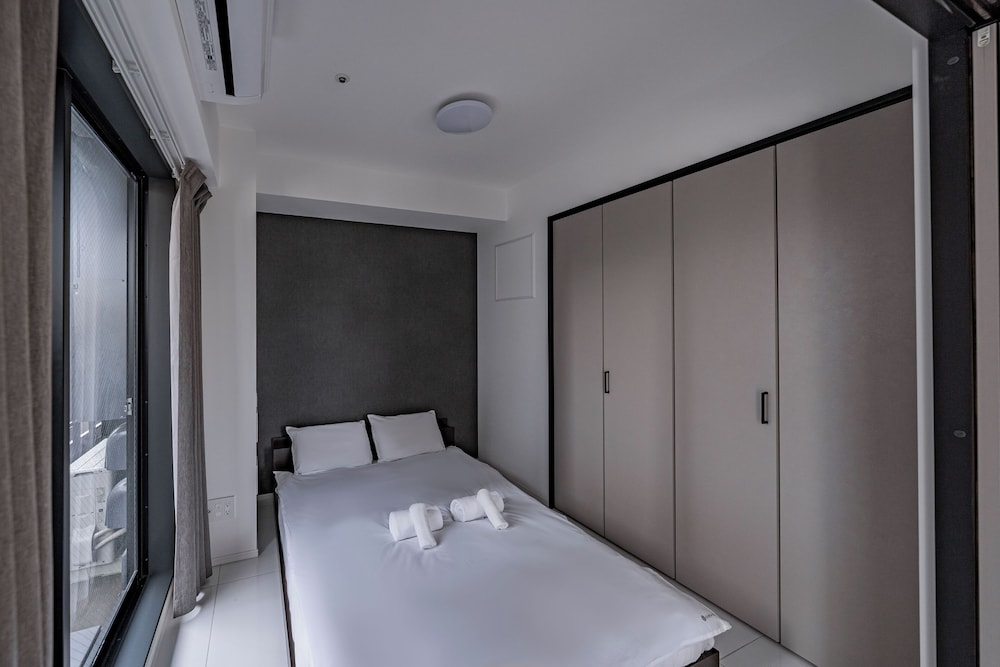 ファミリー スイート バルコニー シティビュー 客室1 | Namba River Side Garden Hotel