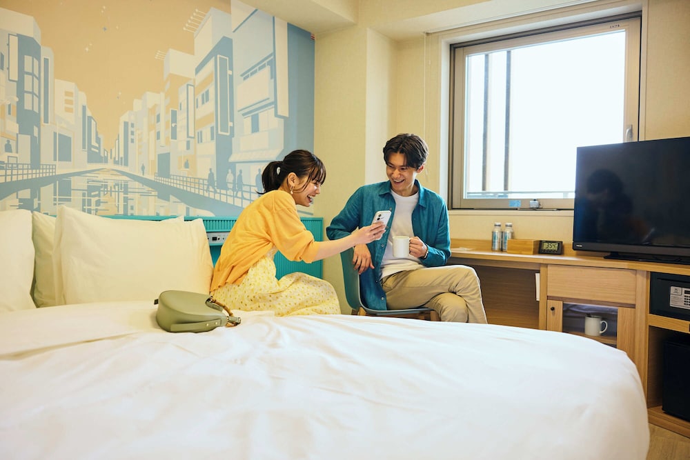 デラックス ルーム ダブルベッド 1 台 | センタラライフなんばホテル大阪