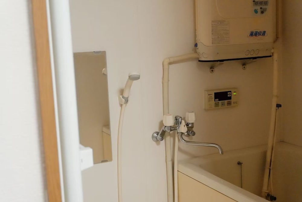 エクスクルーシブ ペントハウス ダブルベッド 1 台ソファーベッド付き 専用バスルーム シティビュー バスルーム0 | 青麦旅館