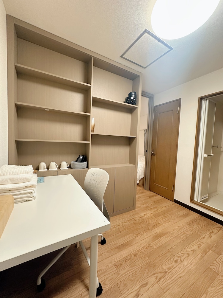 エクスクルーシブ ペントハウス ダブルベッド 1 台ソファーベッド付き 専用バスルーム シティビュー リビング エリア0 | 青麦旅館