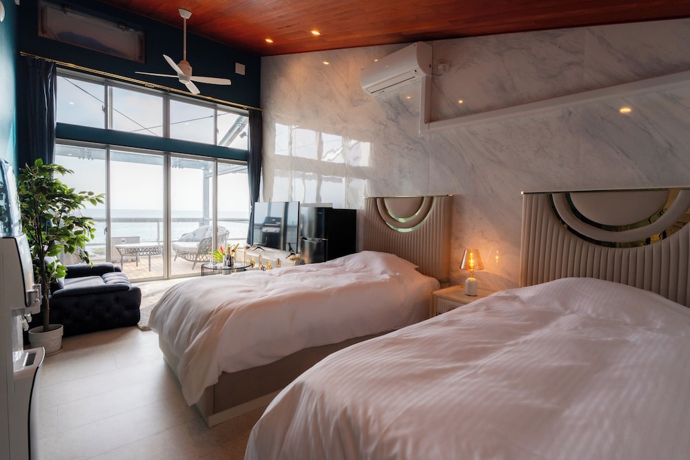 デラックス オーシャンビューサンセット ツイン 禁煙 | Glamping＆Resort WOOD DESIGN PARK NOMA