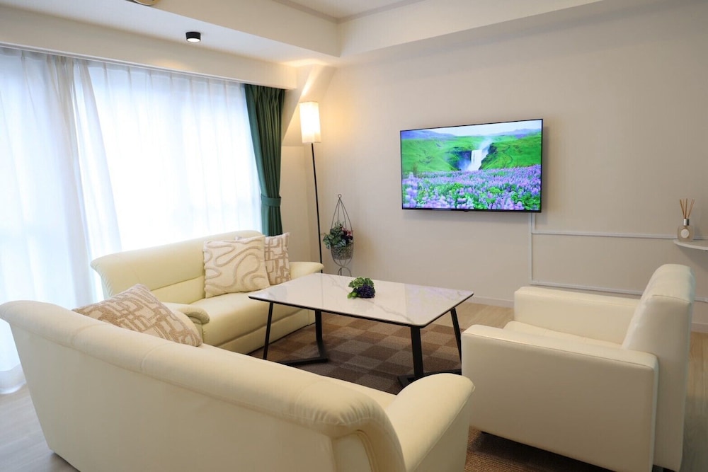 スタジオスイート バルコニー シティビュー リビング エリア0 | ホテルリープ