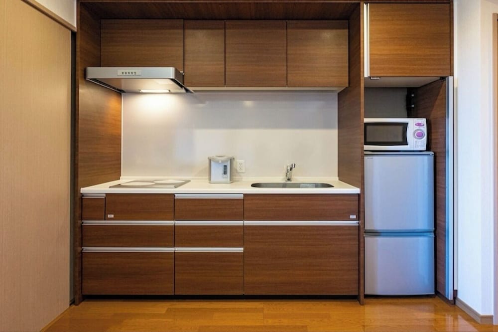 パノラミック スイート バルコニー シティビュー 専用キッチン0 | シーナリー・リゾート駿河