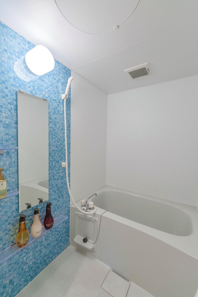 Okinawa BlueBay/オーシャンビュー2LDK・最大6名/那覇空港から車で20分 バスルーム1 | Vent Du Vent