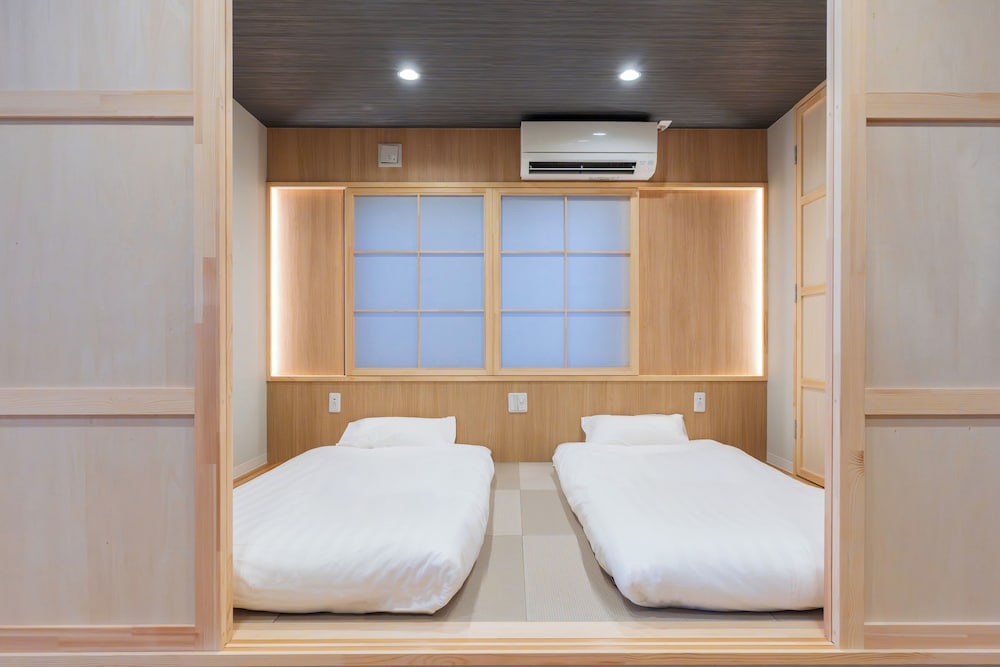 スーペリア スイート 2 ベッドルーム 禁煙 専用バスルーム 客室2 | MARUMI HOTEL Uguisudani