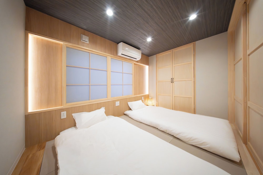 スーペリア スイート 2 ベッドルーム 禁煙 専用バスルーム 客室2 | MARUMI HOTEL Uguisudani