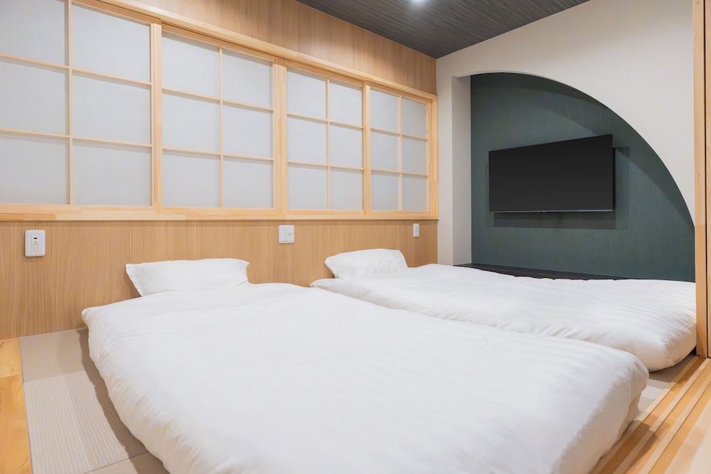 コンフォート スイート 2 ベッドルーム 禁煙 専用バスルーム 客室2 | MARUMI HOTEL Uguisudani