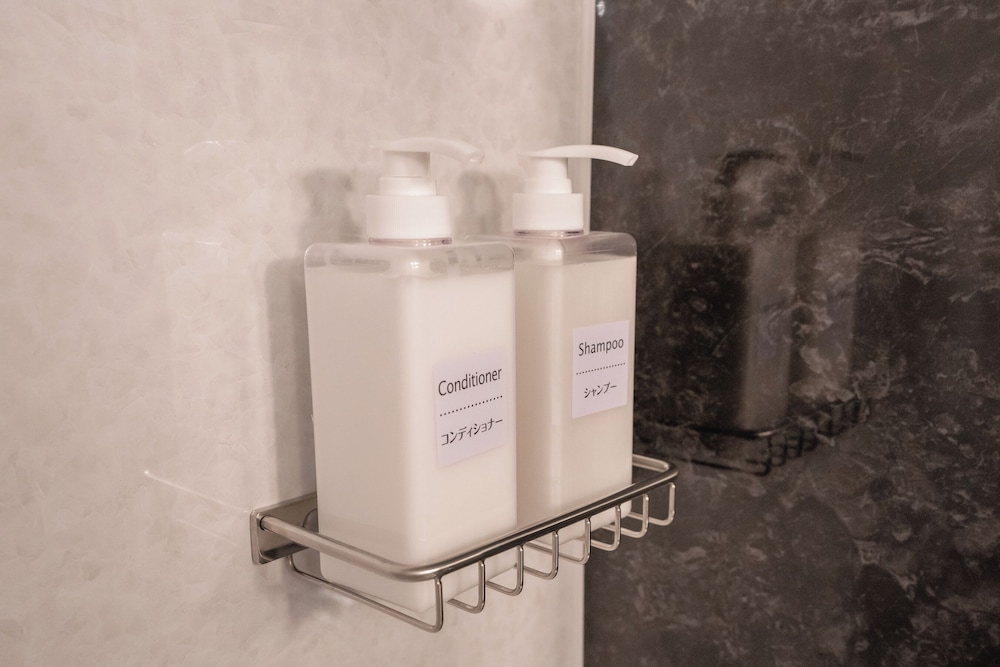 ファミリー トリプルルーム バスルームの設備0 | Coto