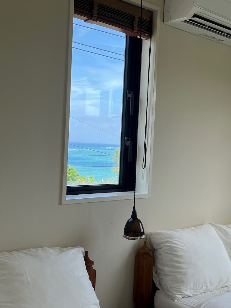 ファミリー コンドミニアム バルコニー パーシャル オーシャン ビュー 客室6 | 瀬名波ハウス B