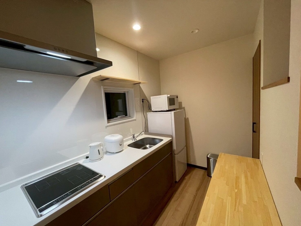 デラックス アパートメント ガーデンビュー 専用キッチン0 | Casa Kokoro Hakuba