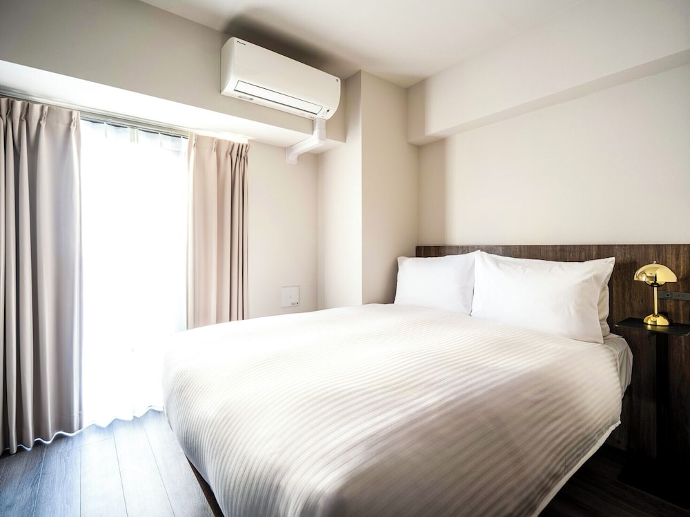 Premier One-Bedroom Apartment - High Floor 客室1 | Section L Akihabara