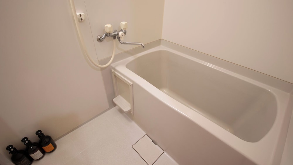 [禁煙] スタンダード和ベッドツイン18畳 内風呂あり(さつき館) バスルーム0 | 大江戸温泉物語 Premium 岩手花巻