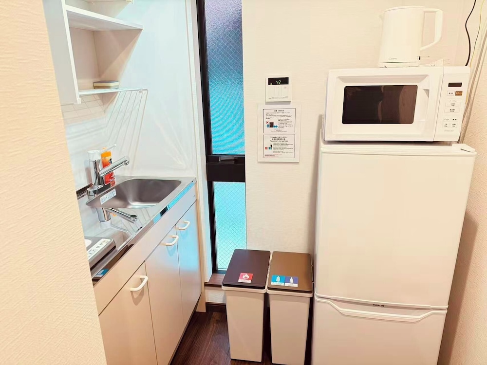 ダブルまたはツインルーム 専用キッチン0 | Nexus Villa Morishiita