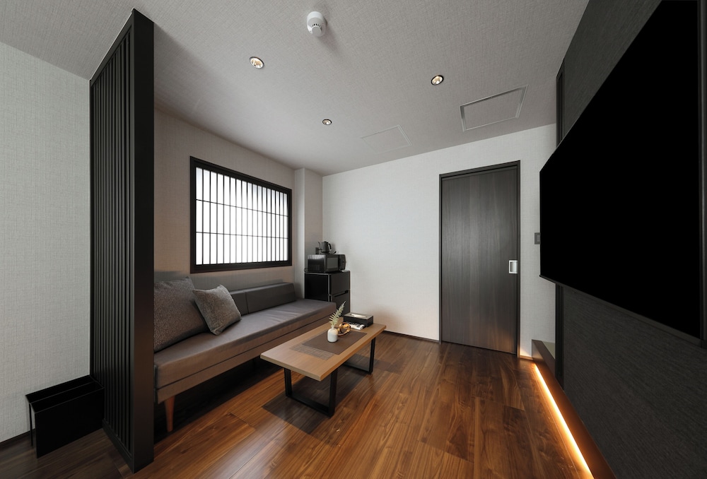 デラックス スタジオ リビング エリア1 | グレイスステイ広島平和公園