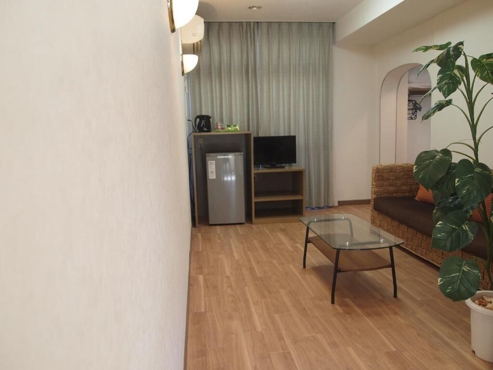 ダブルルーム リビング エリア0 | 仙景プラザ